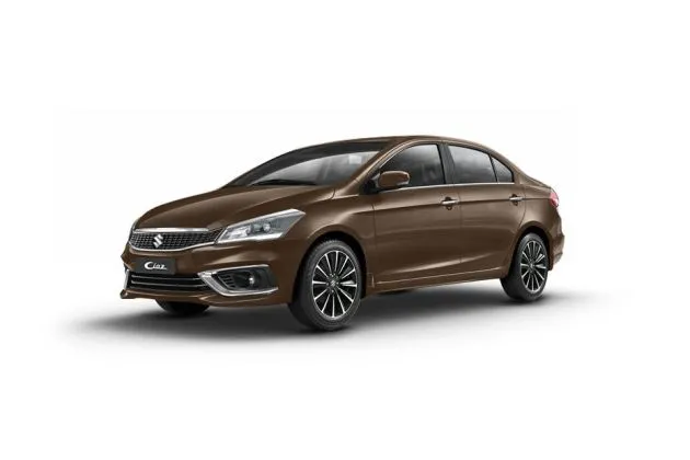 Drive your Pearl Metallic Dignity Brown Maruti CIAZ home from Indus Motors 